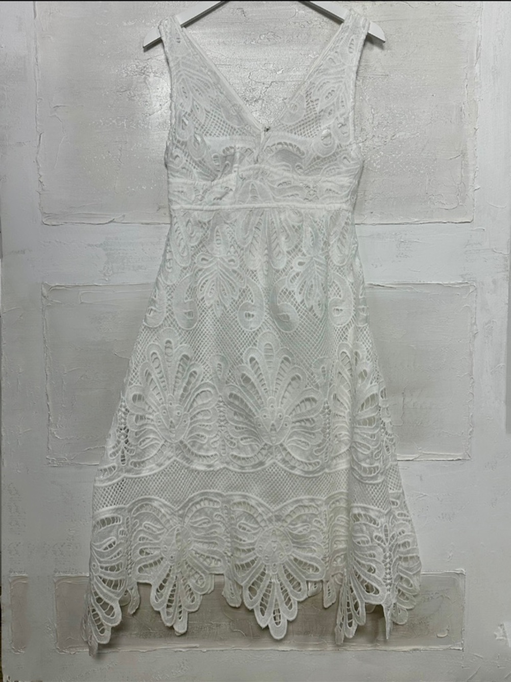 New w tags. White lace dress Skies are Blue